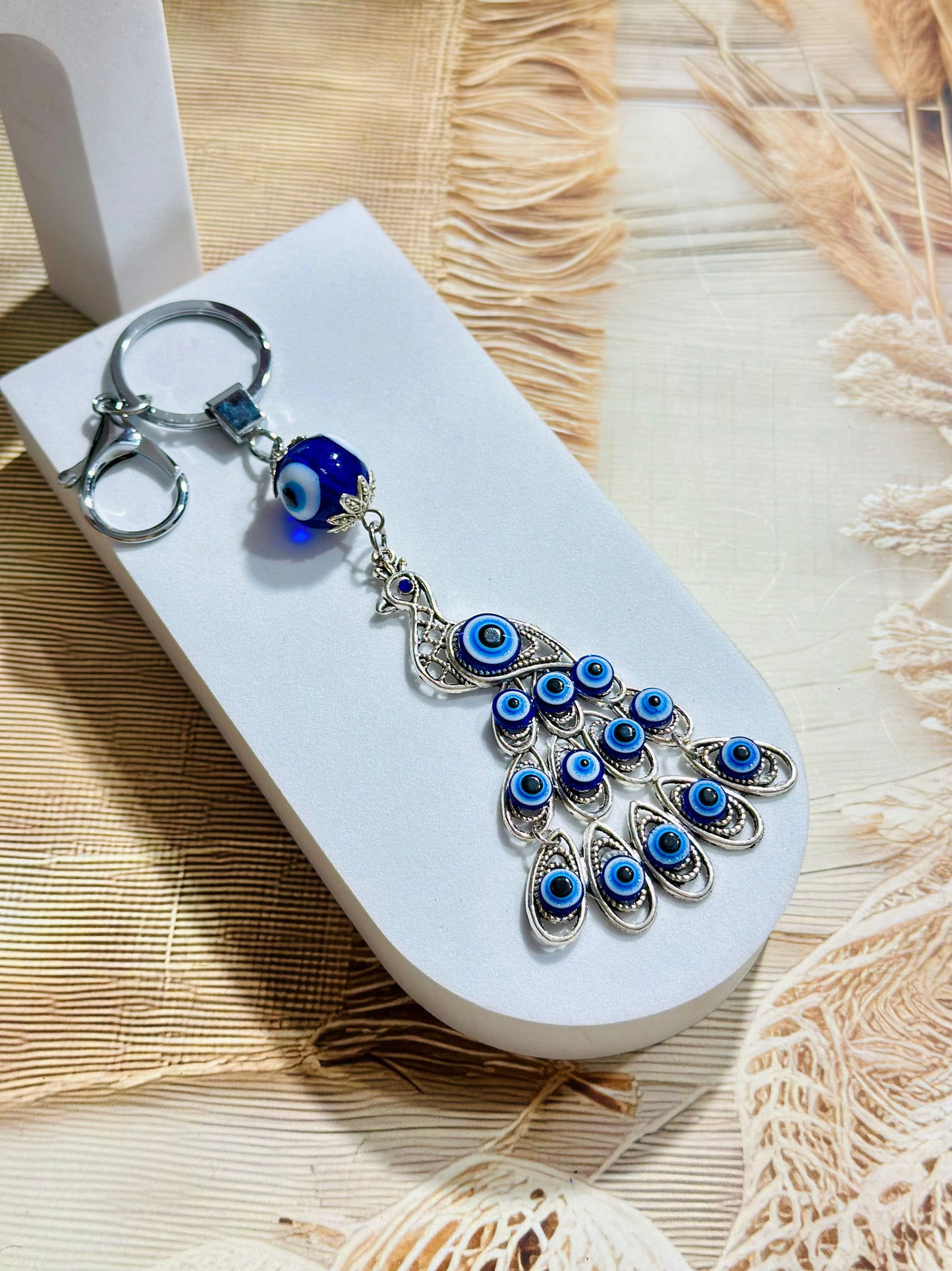 Peacock evil eye keychain